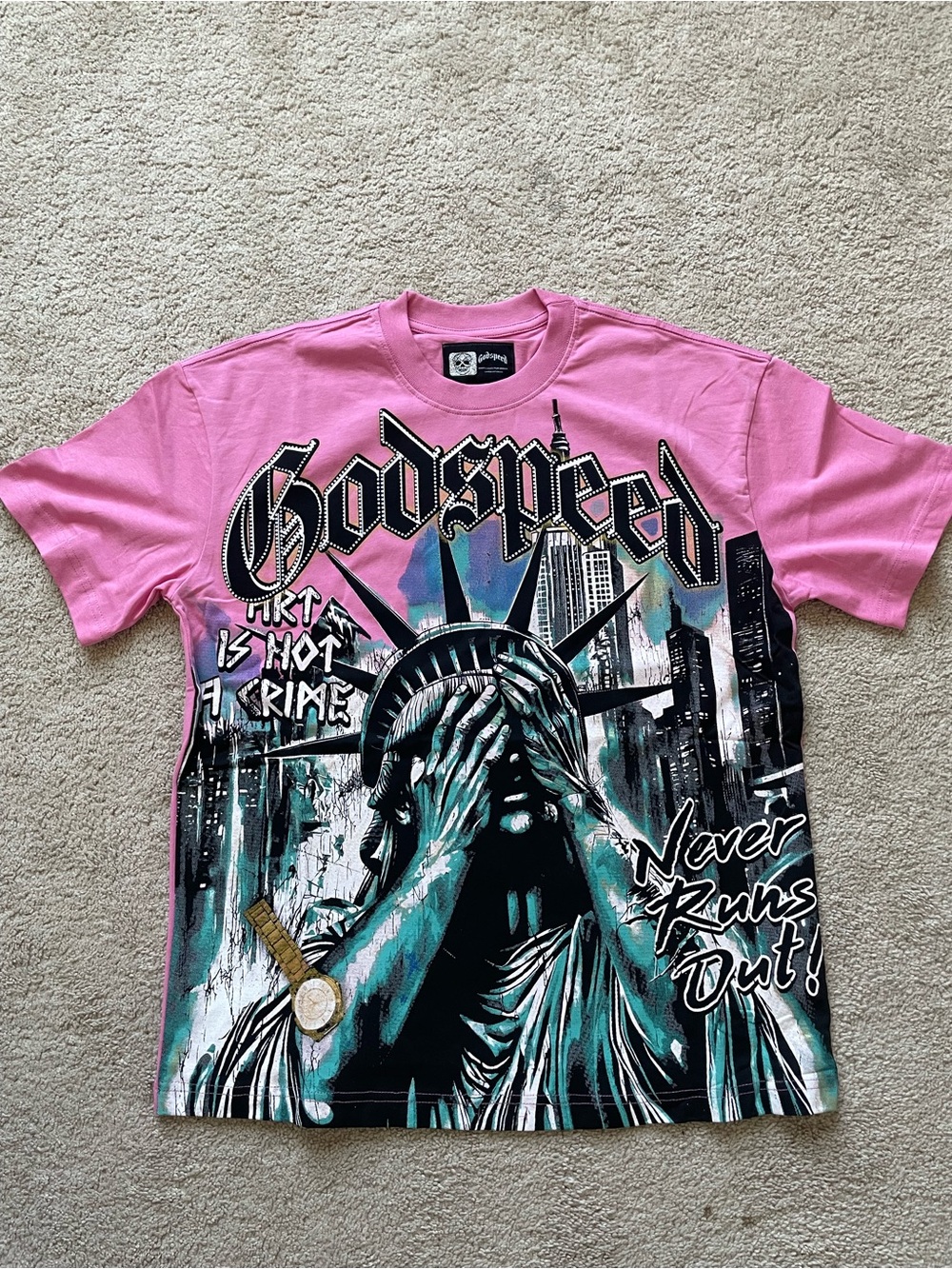 Godspeed Pink Graphic Tee with Statue of Liberty Print